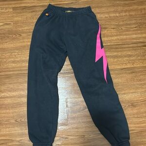 Aviator Nation Black Joggers with Pink Lightning Bolt
